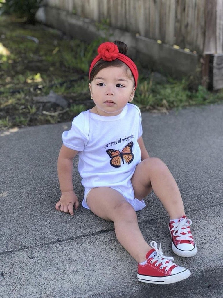 Product of Migration Onesie