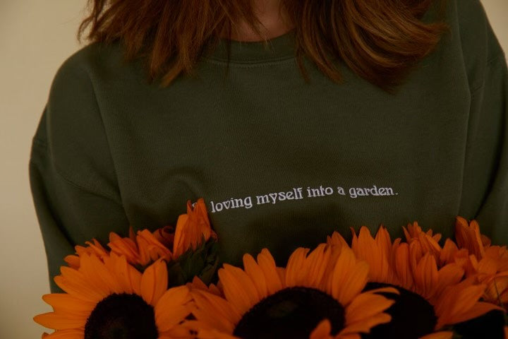 I am loving myself into a garden Sweatshirt